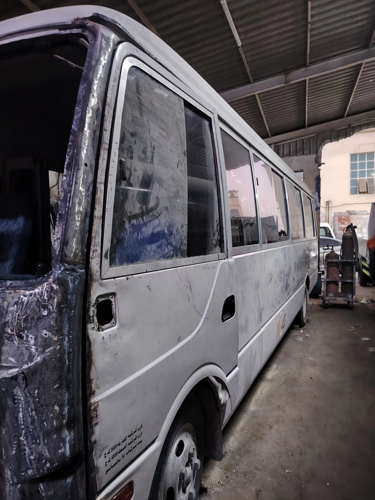 Bus front section metal repair